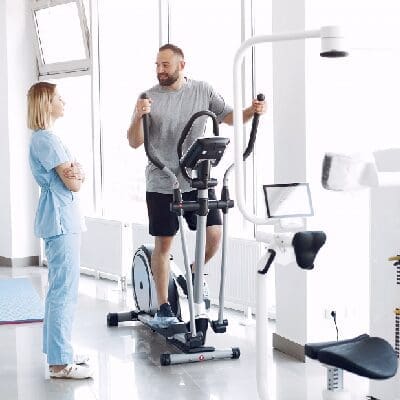 Patient exercising with a physical therapist