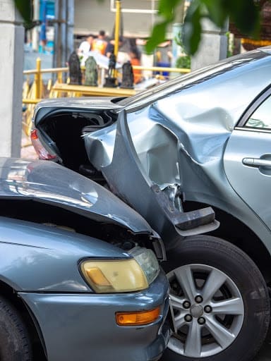 Two cars after a rear end collision